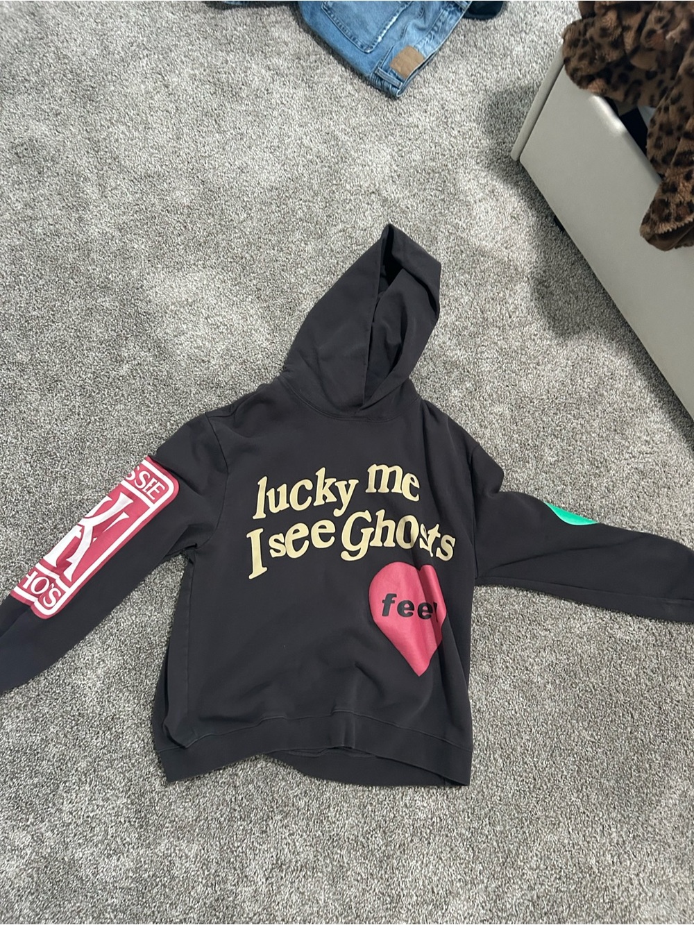 Black Graphic Hoodie Jacket with 'Lucky Me I See Ghosts' Print